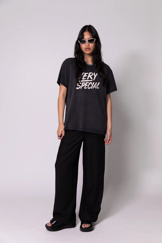 SOMETHING VERY SPECIAL - Stacked Logo - Washed Black-tee-Something Very Special-S-UPTOWN LOCAL