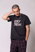 SOMETHING VERY SPECIAL - Stacked Logo - Washed Black-tee-Something Very Special-S-UPTOWN LOCAL